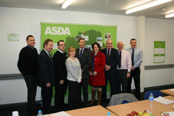 MLAs pictured with the Asda team