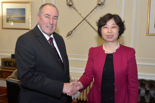 NIABT President and NI Assembly Speaker Mitchel McLaughlin MLA welcomes Madame Wang Shuying to Parliament Buildings